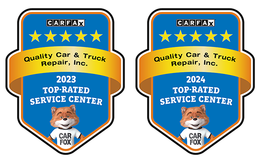 Two Carfax Top Rated Service Center awards: 2023 and 2024, with a cartoon fox mascot. | Quality Car & Truck Repair Inc