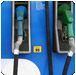Blue and green electric vehicle charging station with two nozzles. | Quality Car & Truck Repair Inc