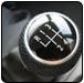 Gear shift knob with shift pattern, showing five forward gears and reverse. | Quality Car & Truck Repair Inc