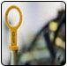 Yellow engine oil dipstick. | Quality Car & Truck Repair
