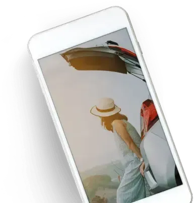 Woman in hat loading car trunk, outdoor setting, on white iPhone | Quality Car Truck Repair