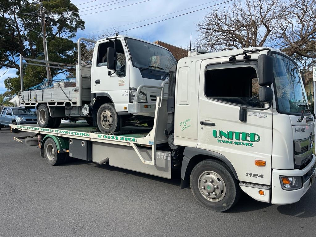 Tilt Bed Tow Truck Towing — Sydney, NSW — United Towing Services Pty Ltd