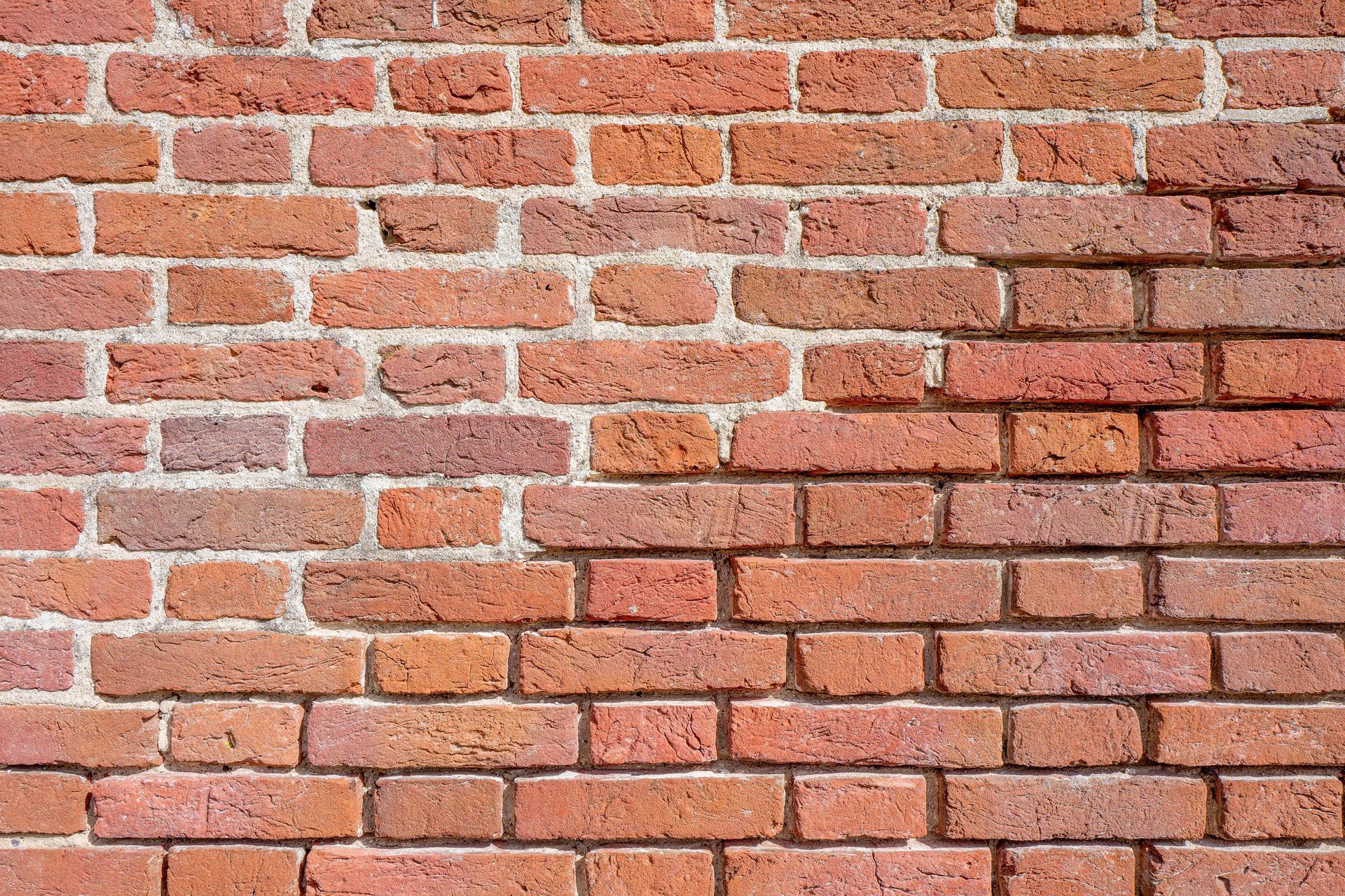 MasonProof™ is a colorless, non-film-forming treatment of mineral substrates (masonry) that ensures the capillary absorption of water is inhibited long term, while textures are not affected. This is a photo of an example of that using a brick wall