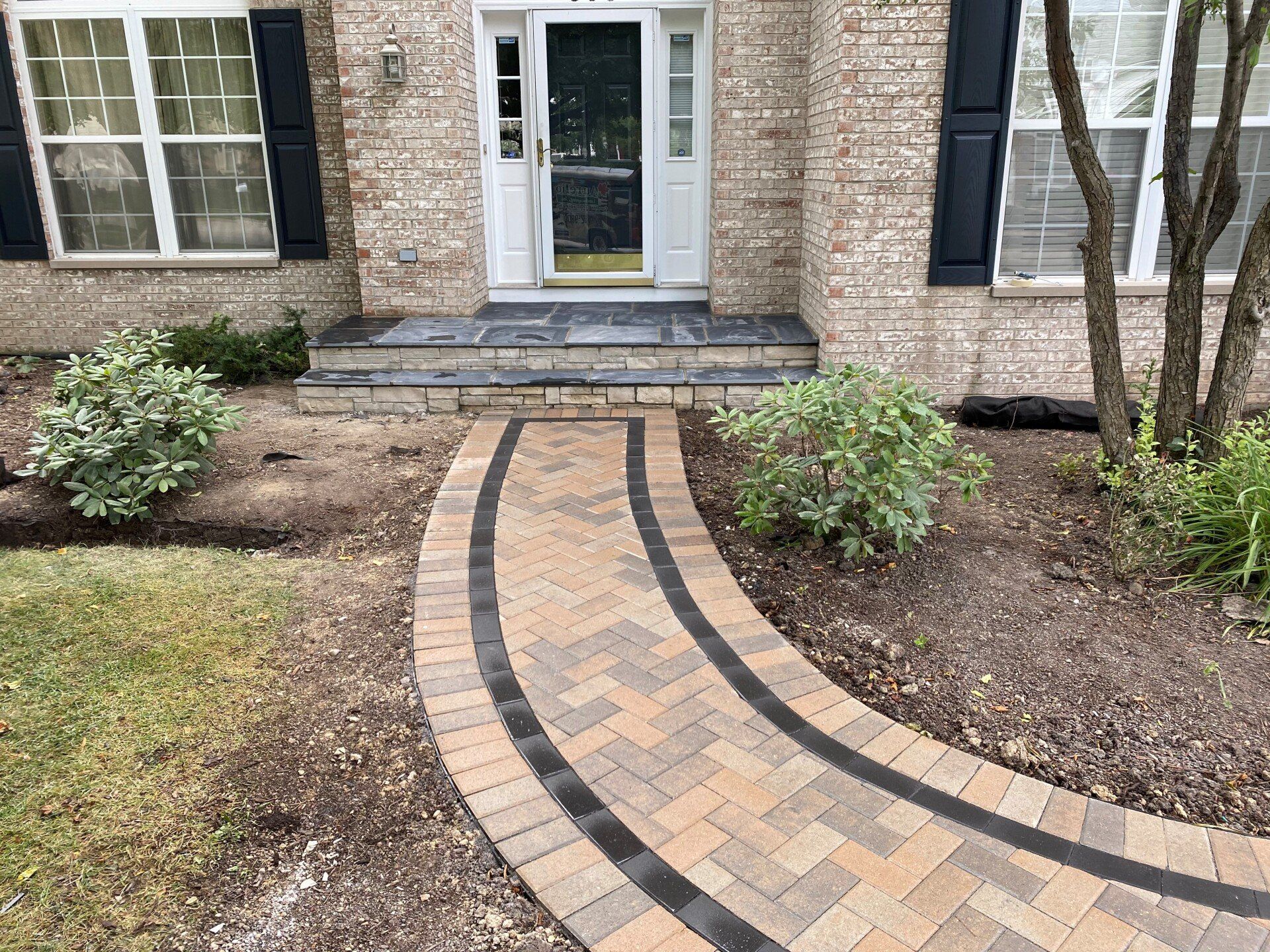 Frontyard with Water Fountain — Highland Park, IL — Aurelio Landscaping