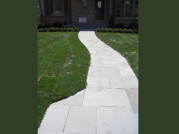 Curving Concrete Sidewalk — Highland Park, IL — Aurelio Landscaping