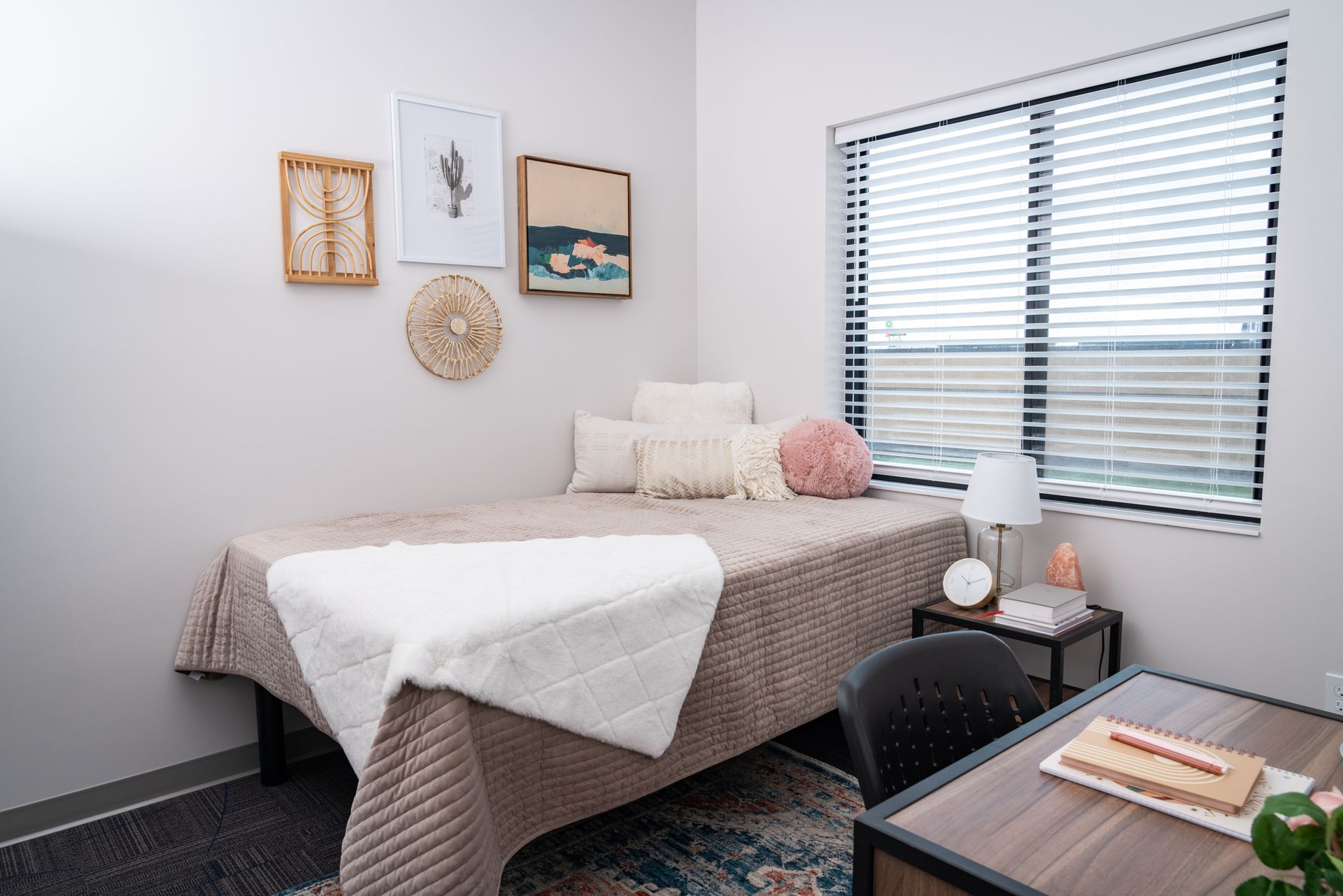 View of a bedroom in an apartment at College Suites in Peosta, Iowa close to NICC's college campus