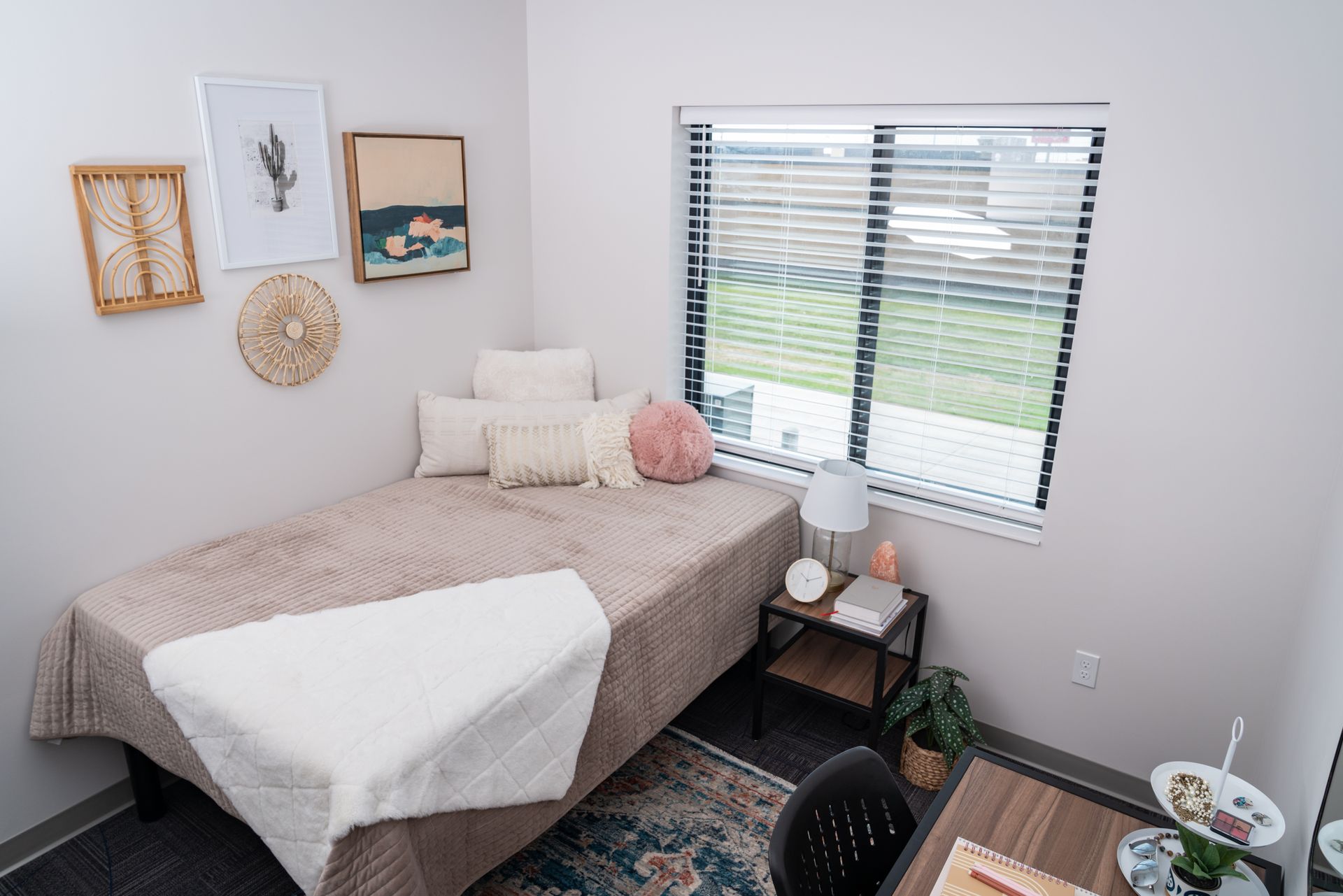 View of a bedroom in an apartment at College Suites in Peosta, Iowa close to NICC's college campus