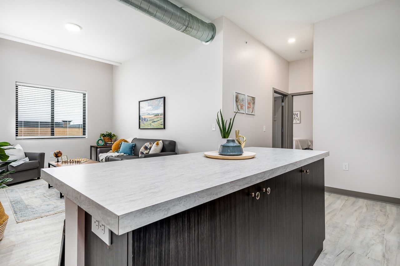 View of the kitchen in a 4 bedroom apartment at College Suites in Peosta, Iowa close to NICC's college campus