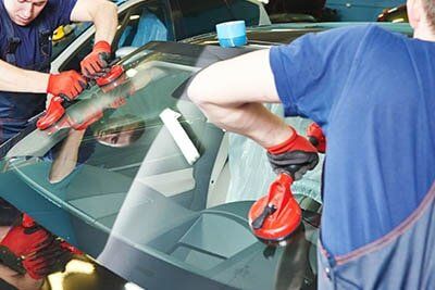 Windshield Replacements — Mechanics Changing the Windshield in Detroit, MI