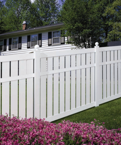 Blue Wooden Fence and Plants — Corpus Christi, TX — Marfileño Roofing and Construction