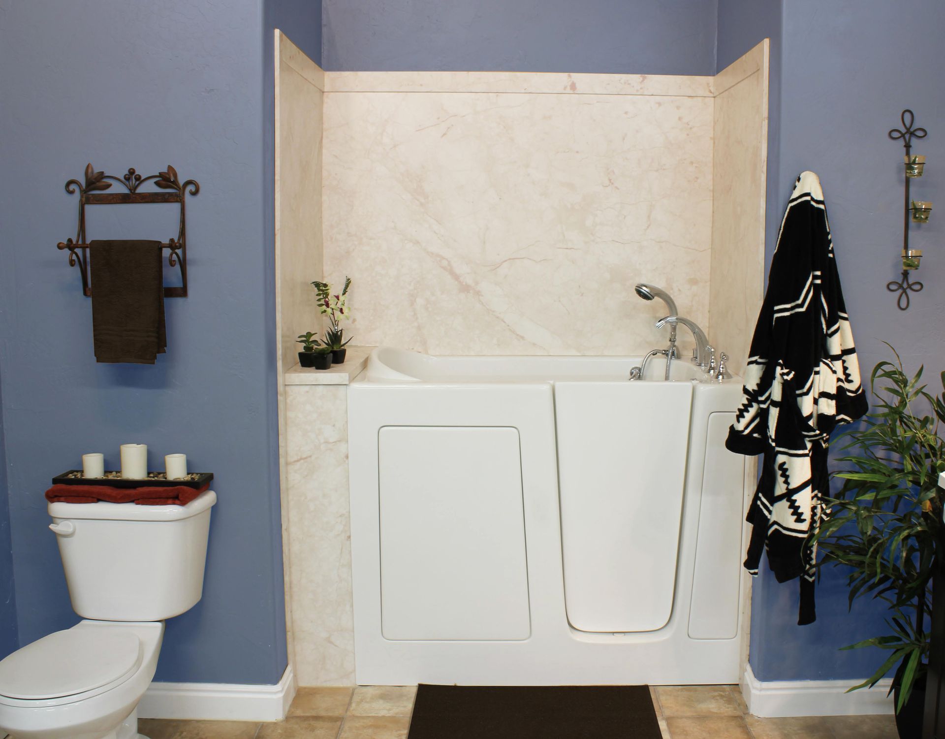 A bathroom with a walk in tub and a toilet