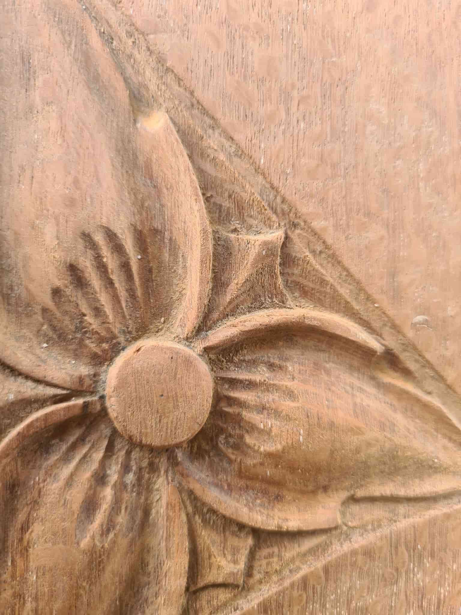 A Close Up of a Carving of a Flower on a Wooden Surface — The Restoration Barn In Te Kowai, QLD