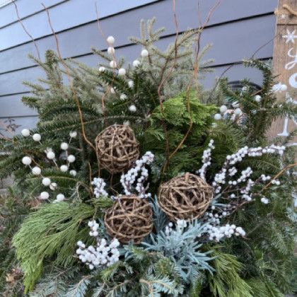 A display of christmas decorations in front of a house