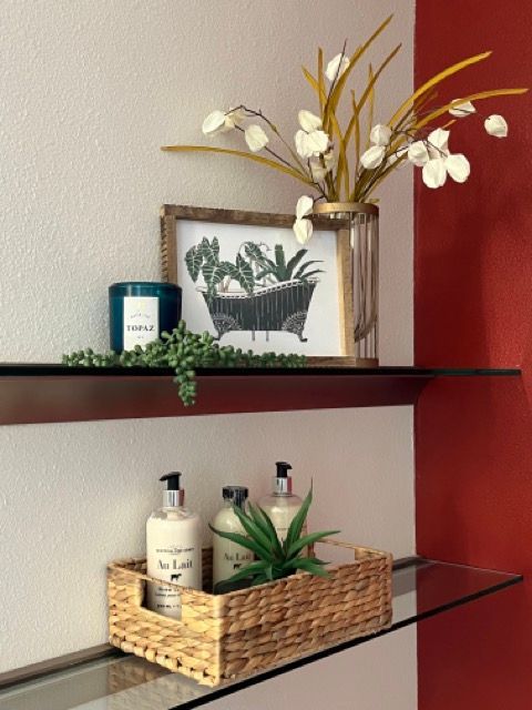 A shelf with a picture of a bathtub on it