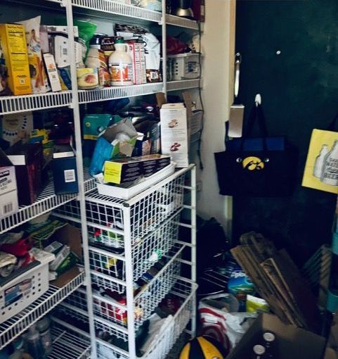A pantry filled with lots of items including a bag that says iowa