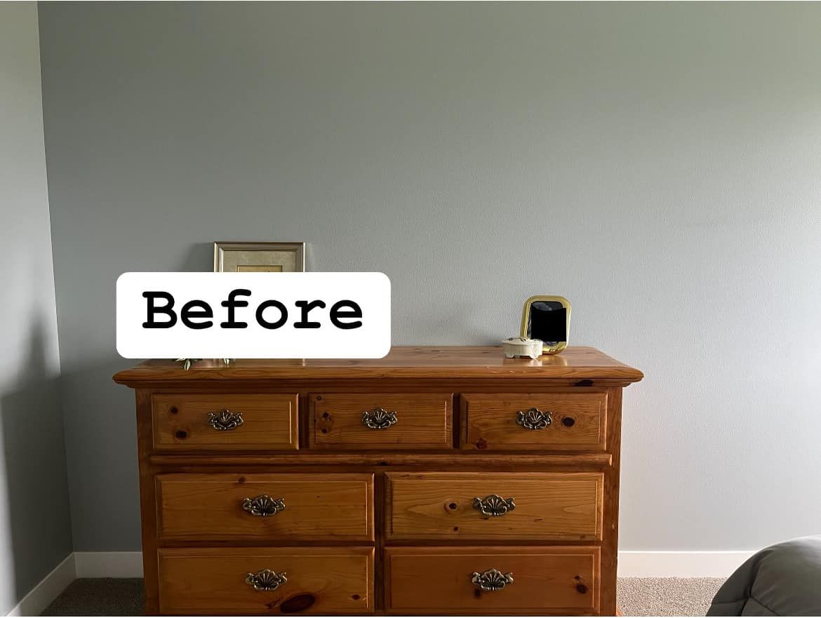 A before picture of a wooden dresser in a bedroom