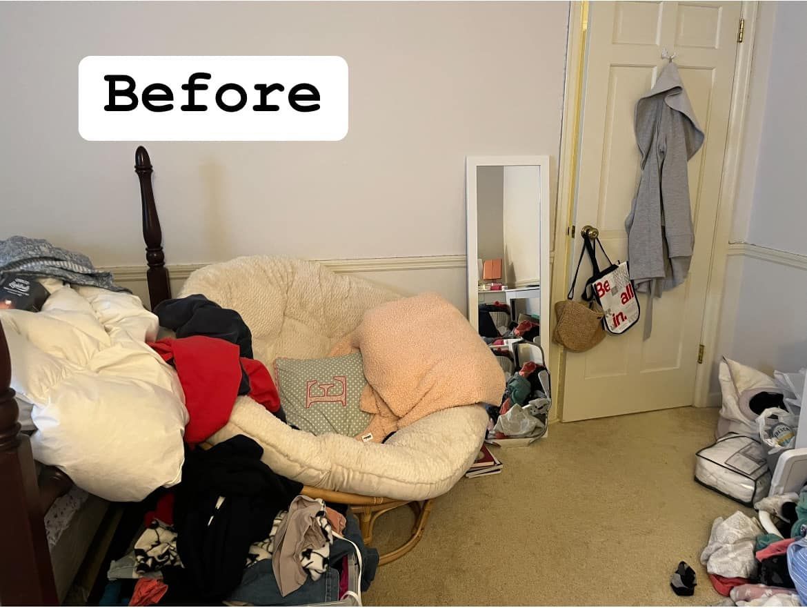 A before picture of a messy bedroom with a chair and a mirror