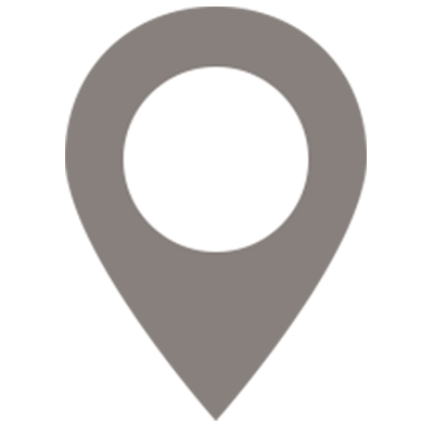 A map pin with a circle in the middle on a white background.