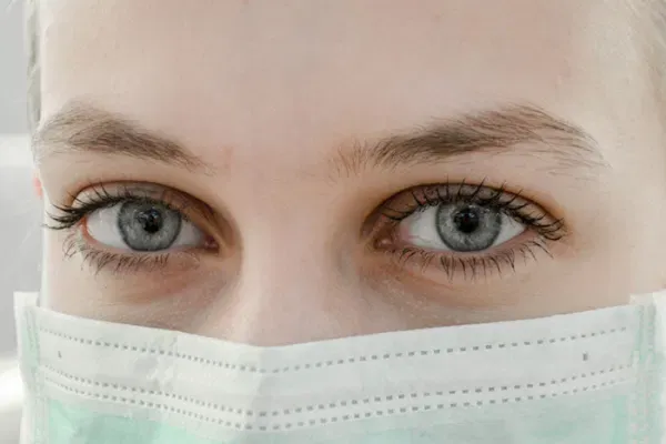 Woman Wearing Surgical Mask — Supplements & Organic Produce in Mid North Coast, NSW
