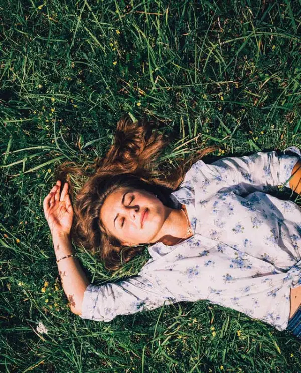Woman Relaxing Under The Sun — Supplements & Organic Produce in Mid North Coast, NSW