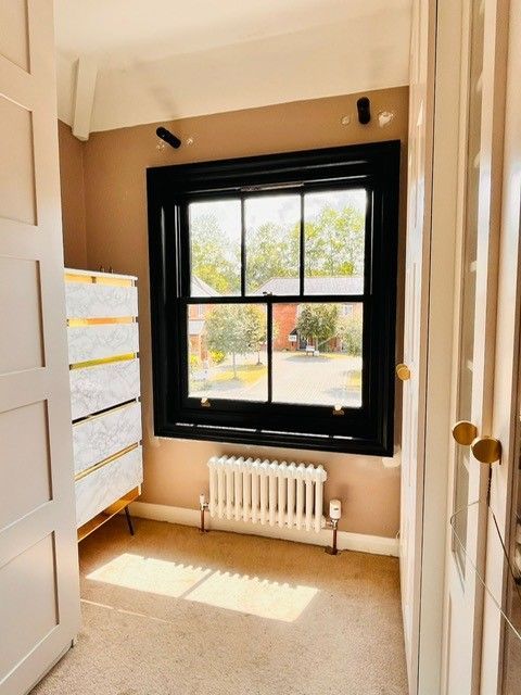 Spiral Balanced, Accoya Sash Window finished in Satin Black internal and Beige/Grey External