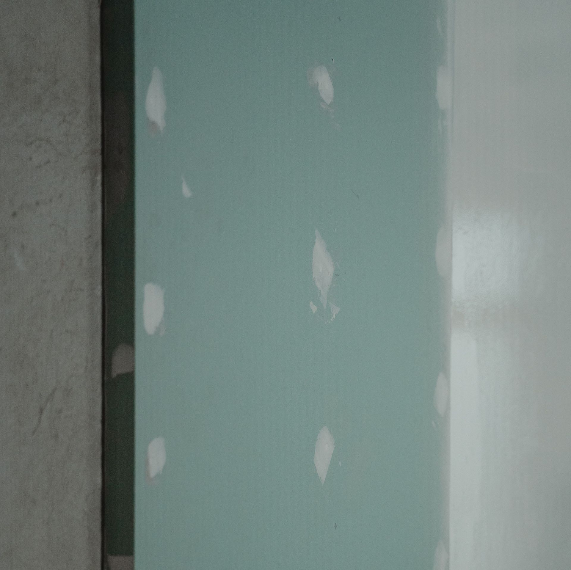 Skilled worker hands carefully arranging and securing roof tiles, creating a durable and precise roofing structure.