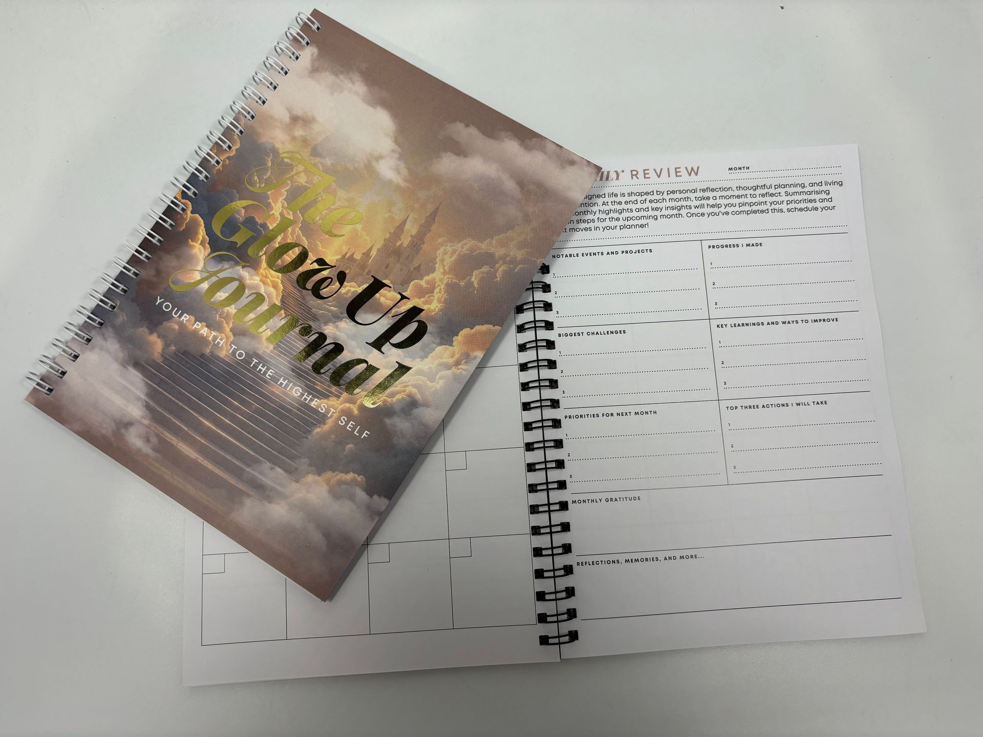 A spiral bound book titled grow up journal