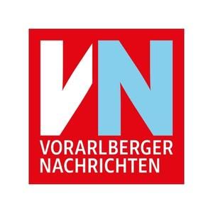 A red and blue logo for vorarlberger nachrichten