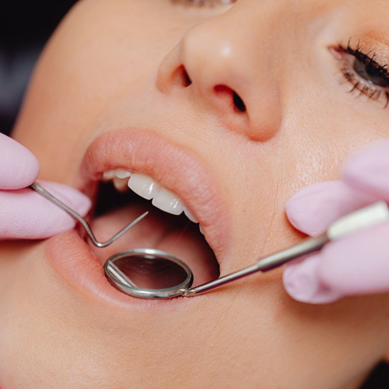 woman getting a dental cleaning in Hammond, Indiana