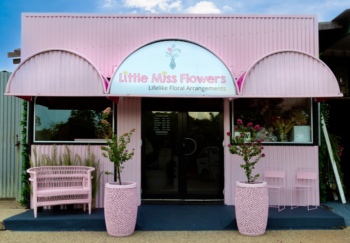 Charming pink flower shop in Darwin, a haven for flower enthusiasts.