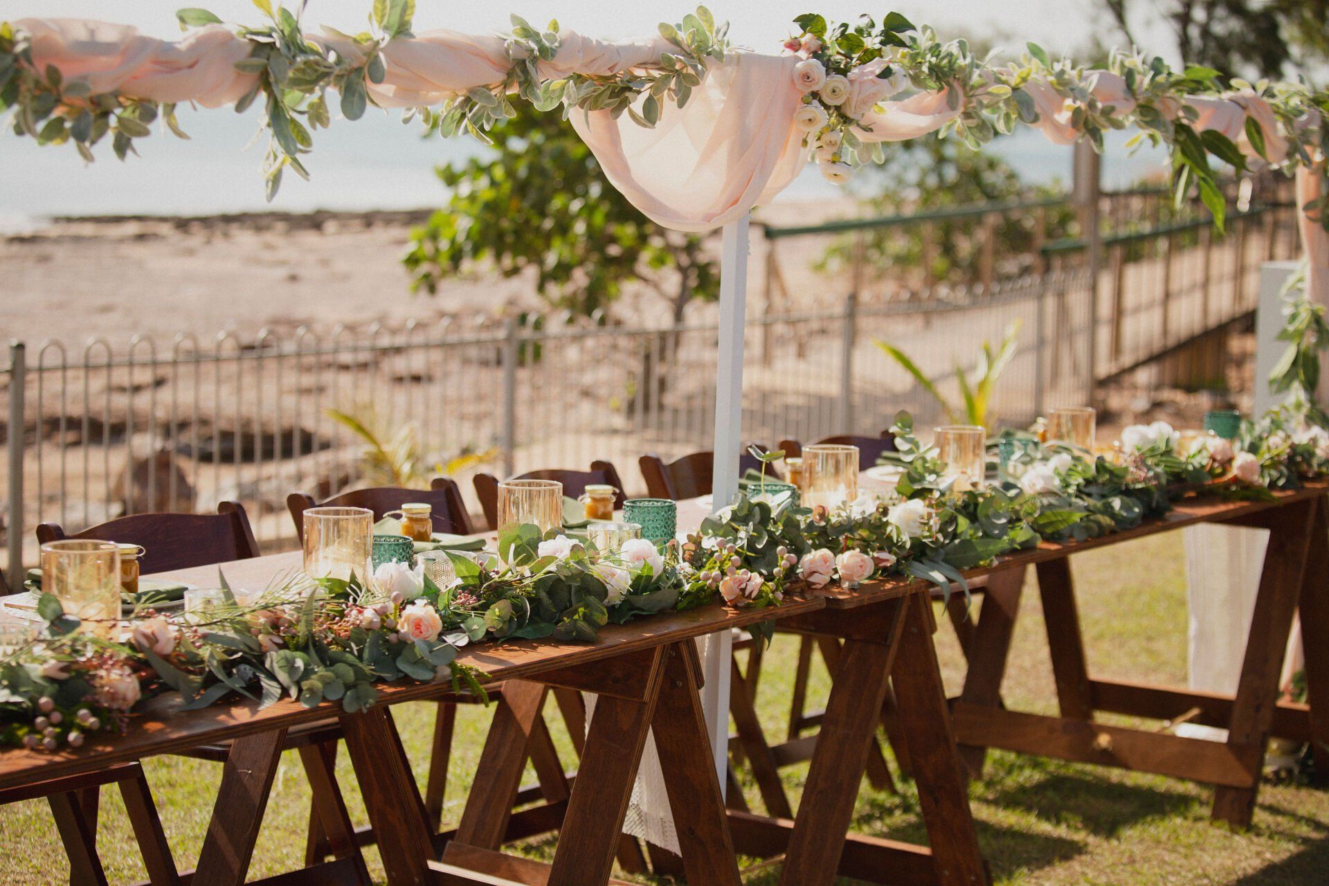 Elegant wedding table arrangements, crafted with love by Darwin's top florists.