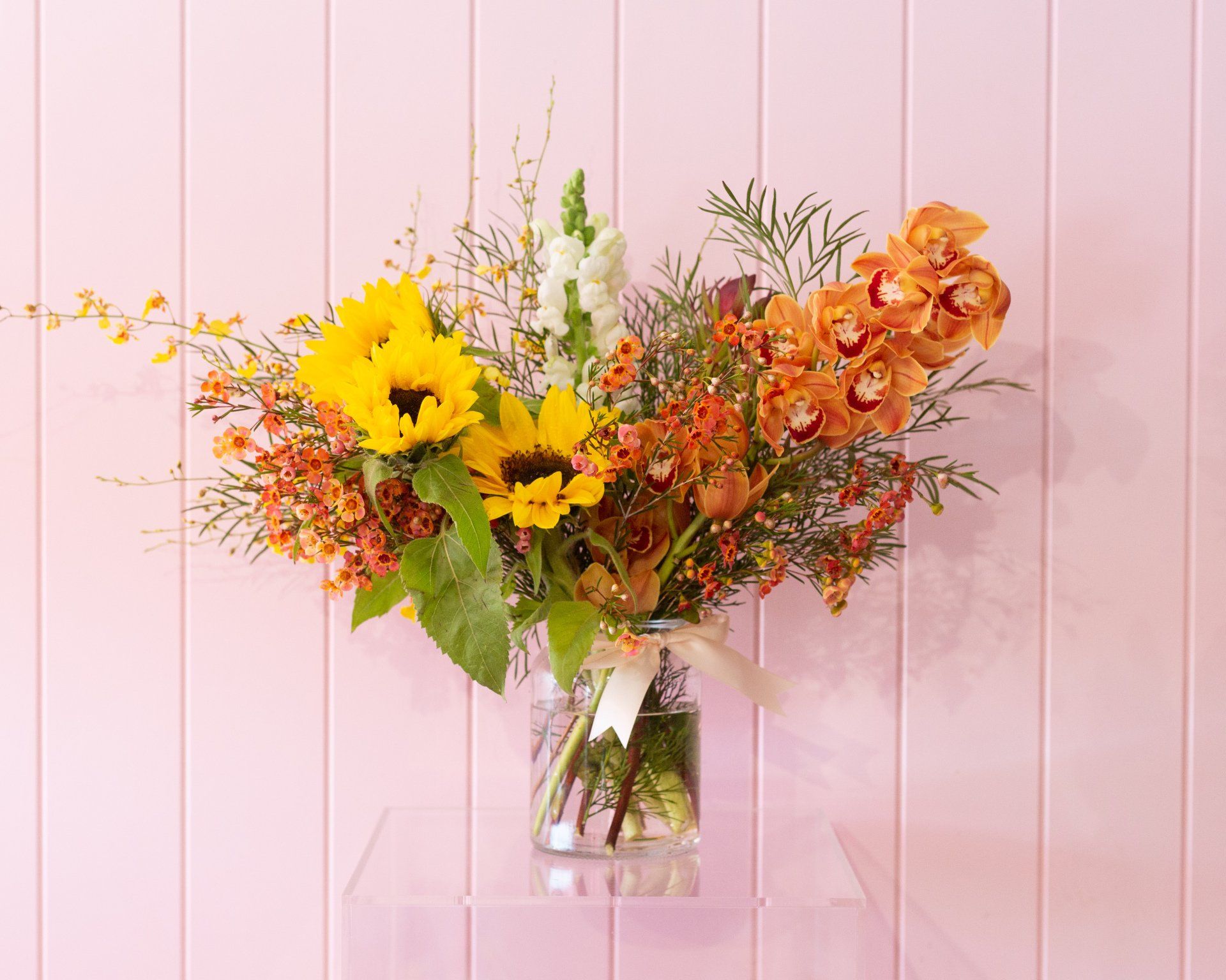 Close-up of a beautiful floral arrangement in a vase, showcasing fresh flowers.