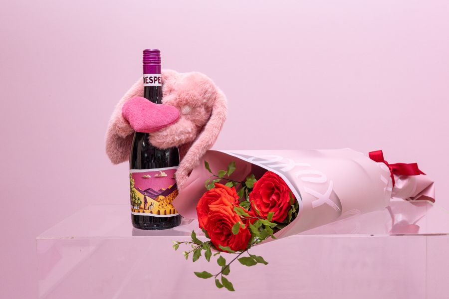 Cherished moments captured with a lady holding baby toys, a gift from Darwin's wedding collection.