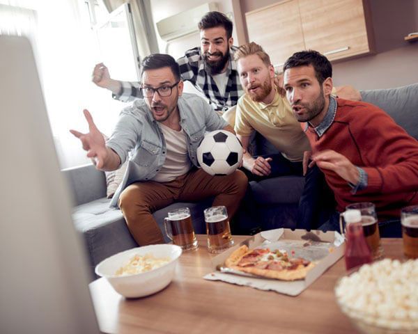 Men watching Game Together