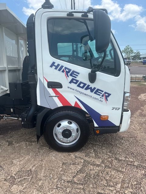 A Red Wall With A Sign That Says Please Pay Here — Northern Territory Sign Services in Winnellie, NT