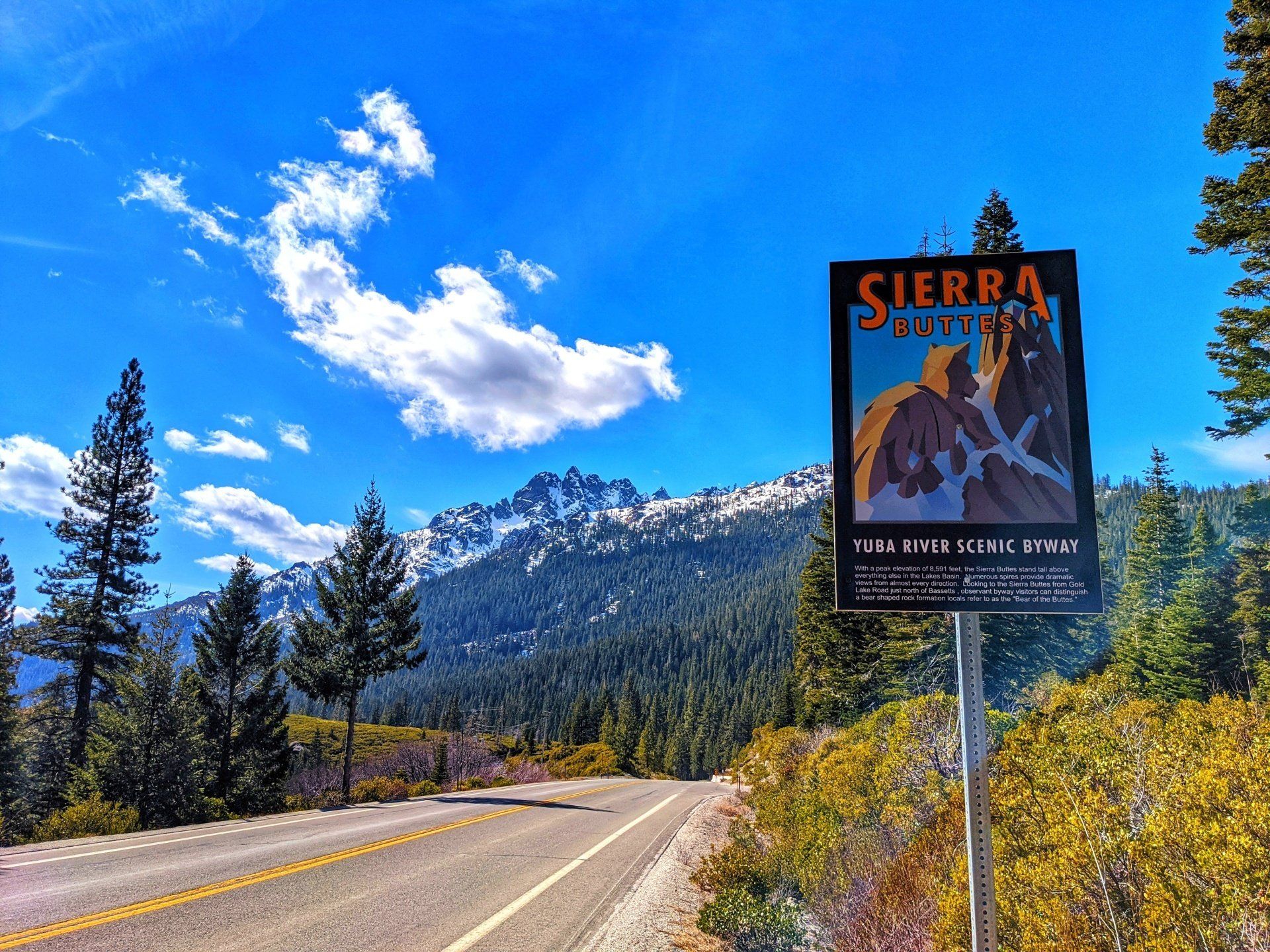 A sign on the side of a road that says sierra nevada