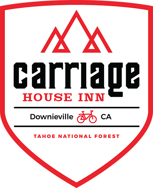A logo for carriage house inn in downieville ca