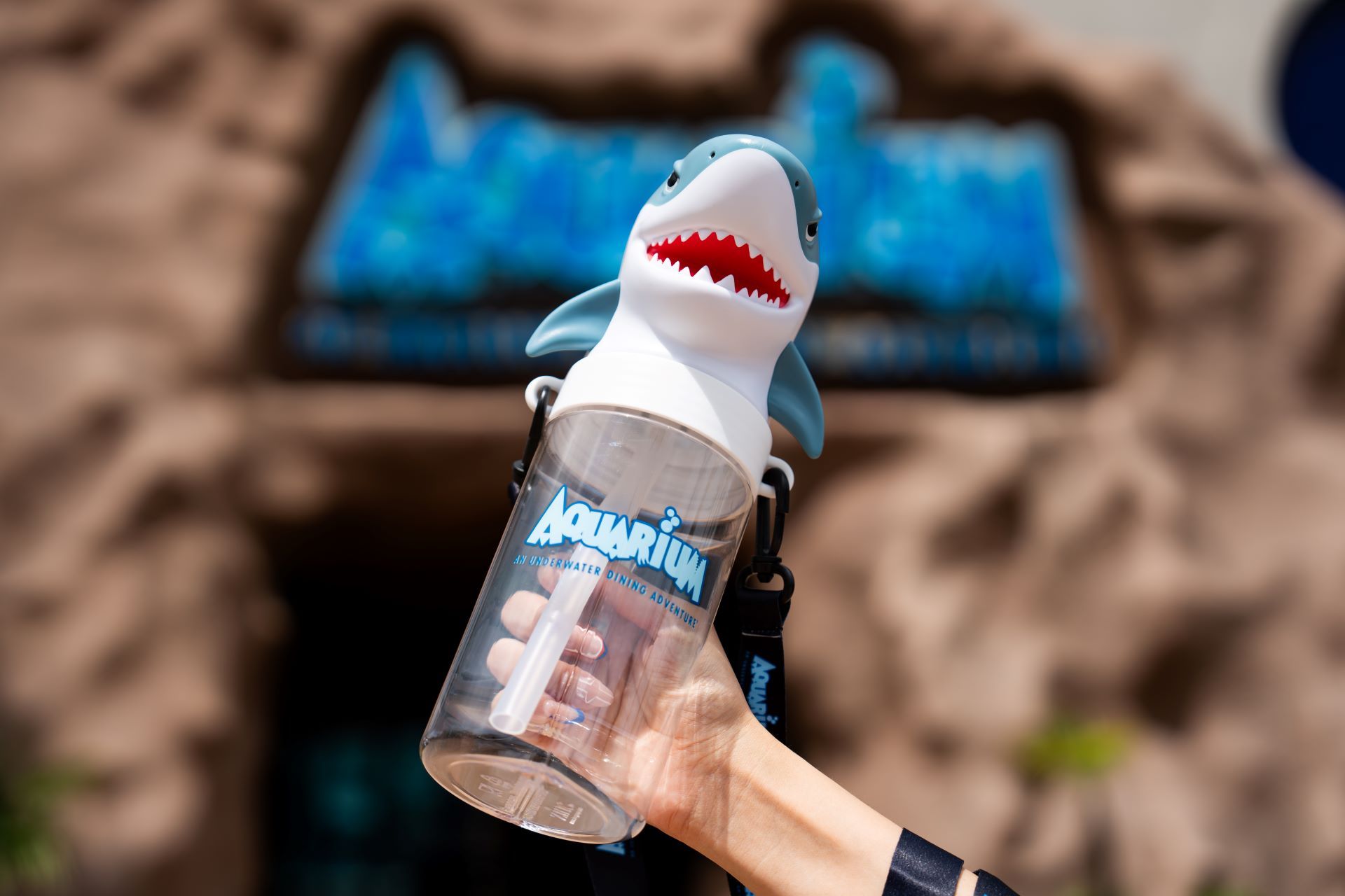 An advertisement for reef refreshments with two sharks on it
