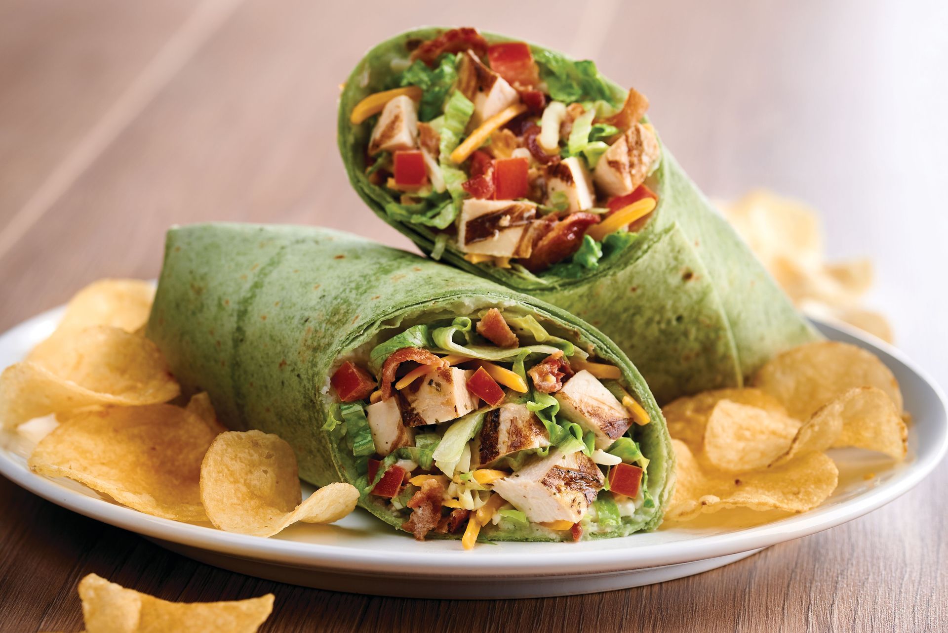 A sandwich and french fries are on a table