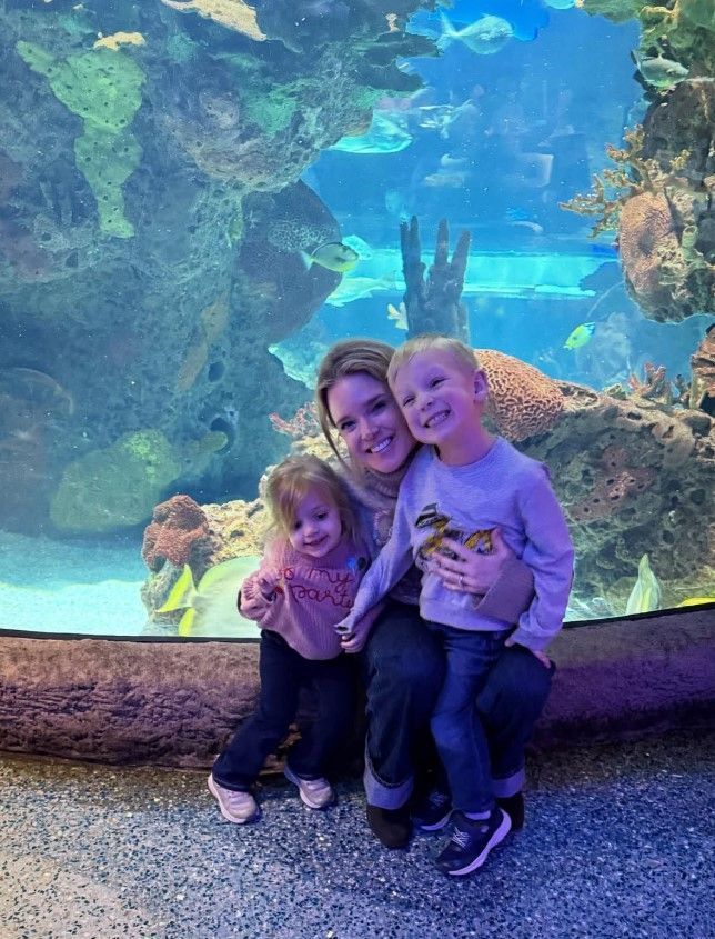 friday family night aquarium mom and son