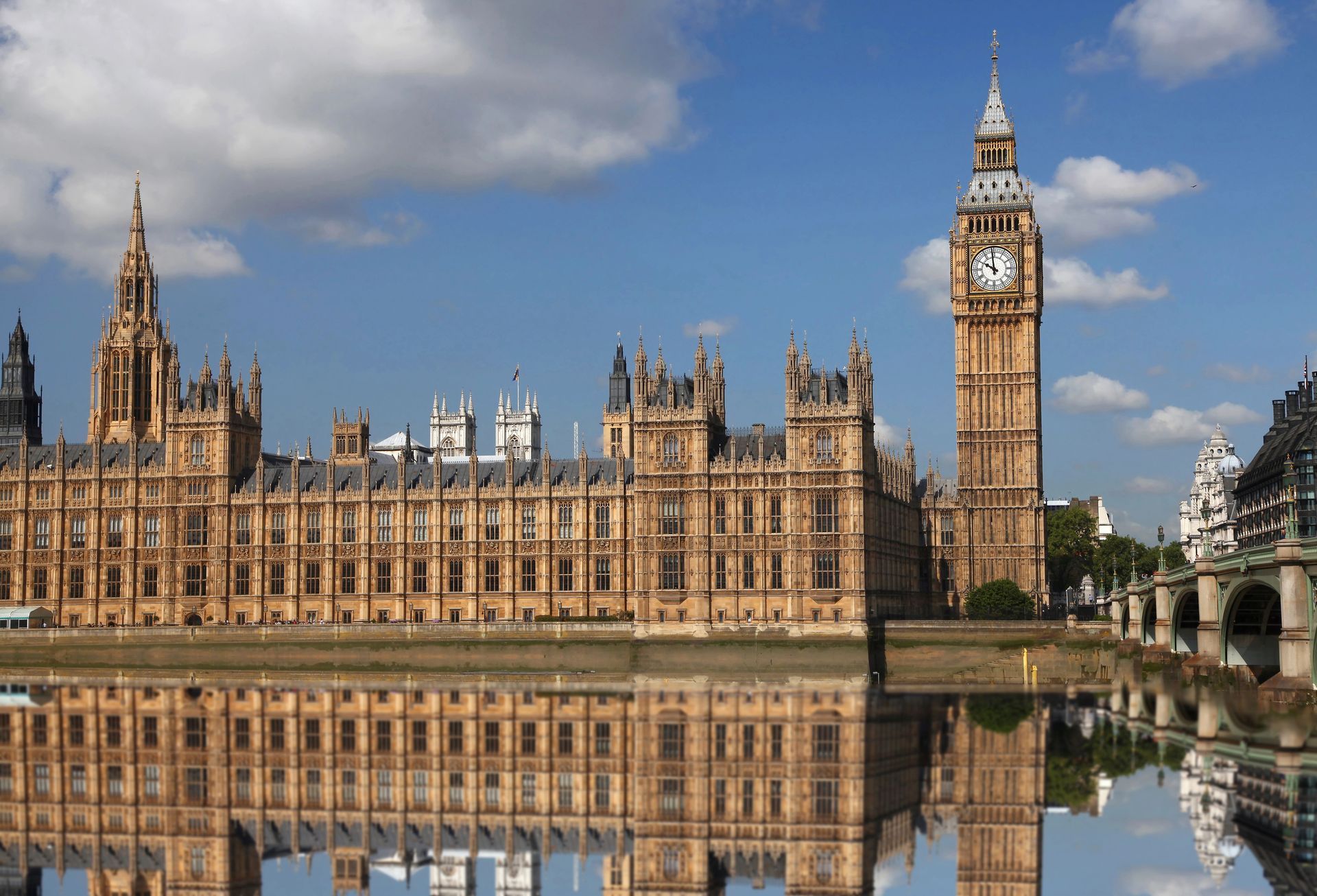 UK Parliament looking across the River Thames from the South Bank alongside Westminster Bridge