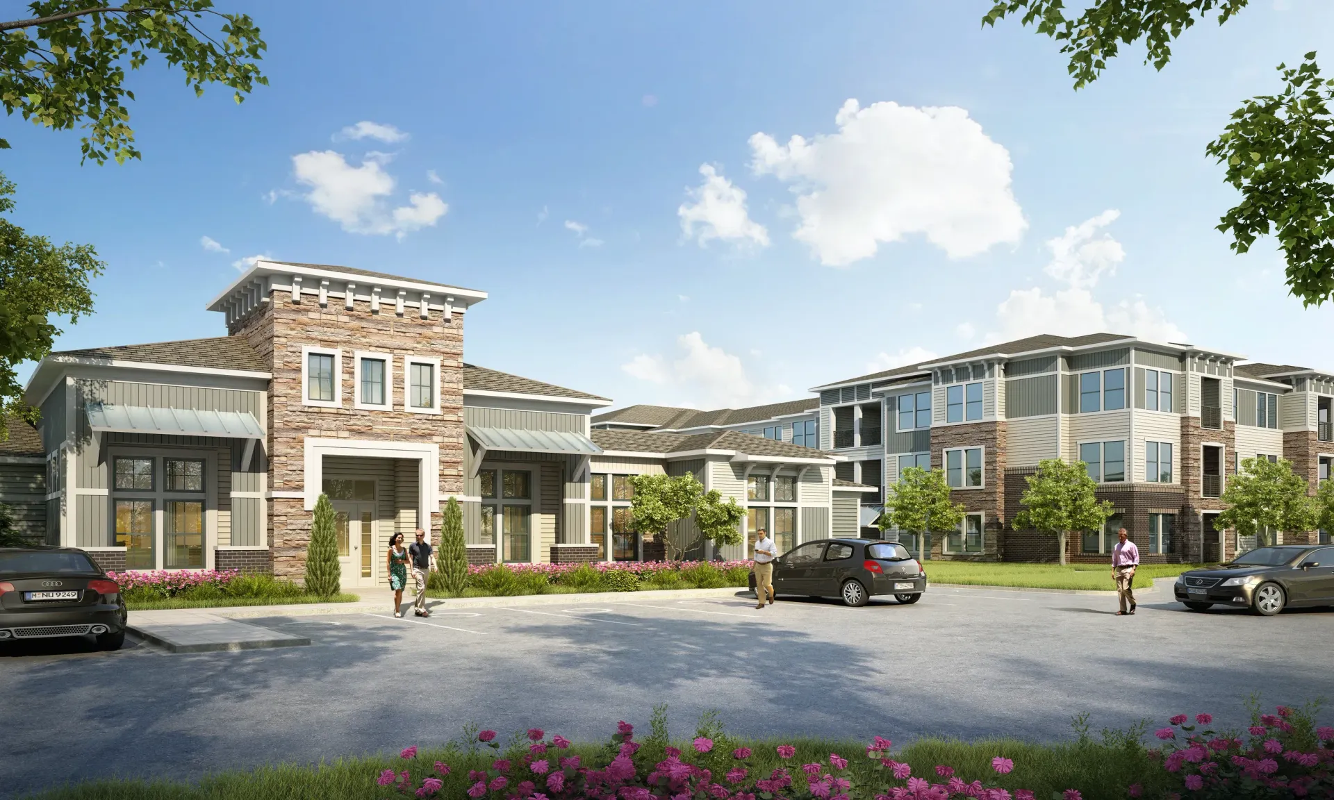 Exterior view of a modern apartment community with stone accents, landscaping, and parked cars.
