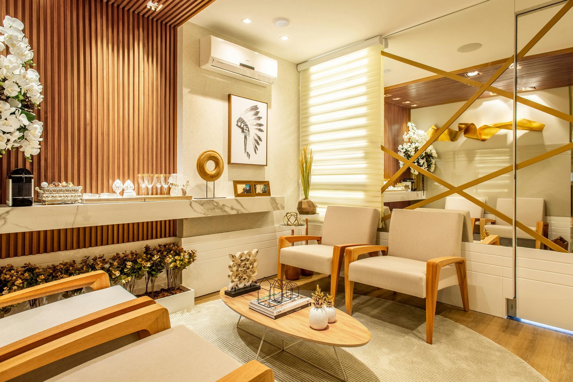 Cozy waiting room with wood accents, neutral tones, comfortable seating, and decorative flowers and art.