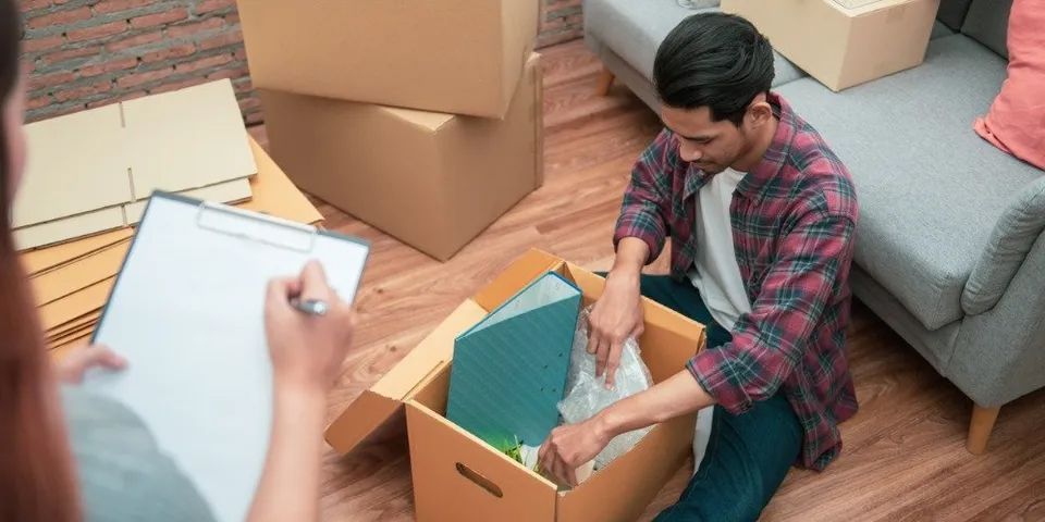 man opening storage box
