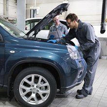 Man Checking The Car With Technician — Kingsley, MI  — BC Transmission