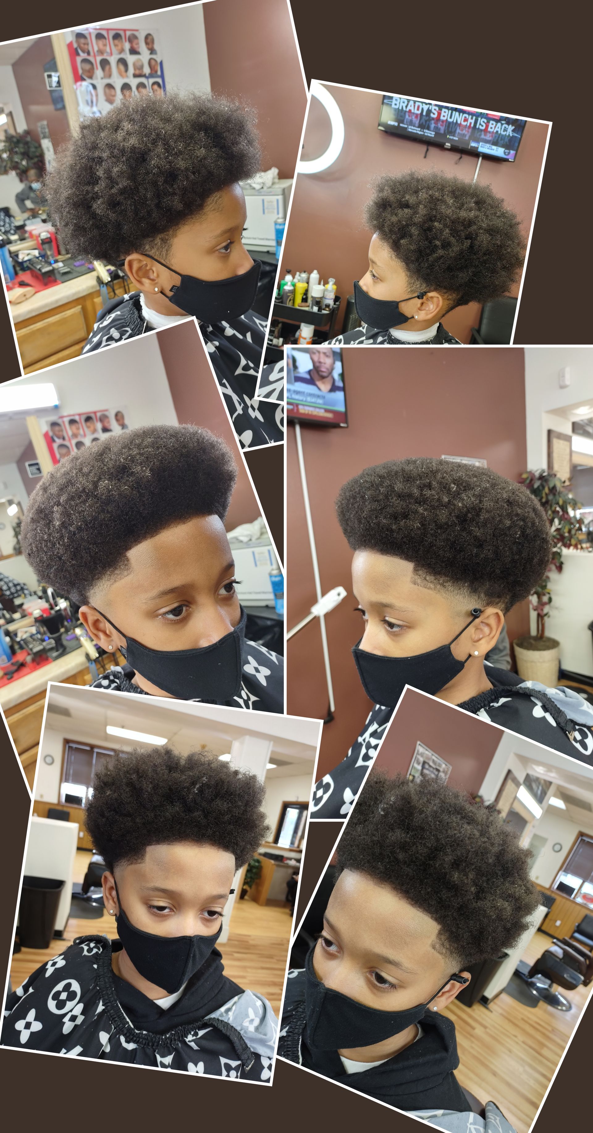 A young boy wearing a mask is getting his hair cut at a barber shop.