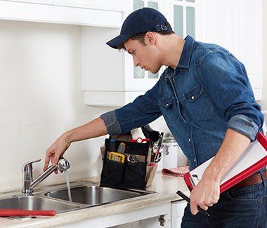 Plumber Checking Kitchen Sink — Lafayette, LA — Colville Plumbing