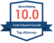 A badge that says avvo rating 10.0 todd edward gaudin top attorney