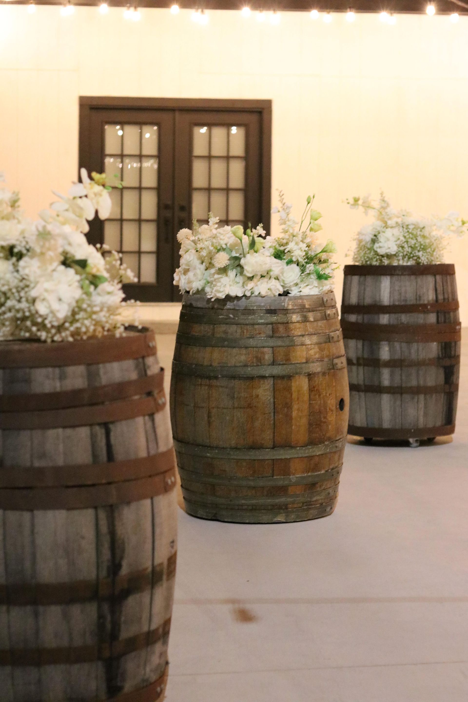 Charming patio setup with a few barrels at an Austin wedding venue