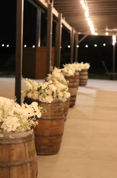 Event venue patio in Austin, Texas with a few barrels set up for a wedding celebration